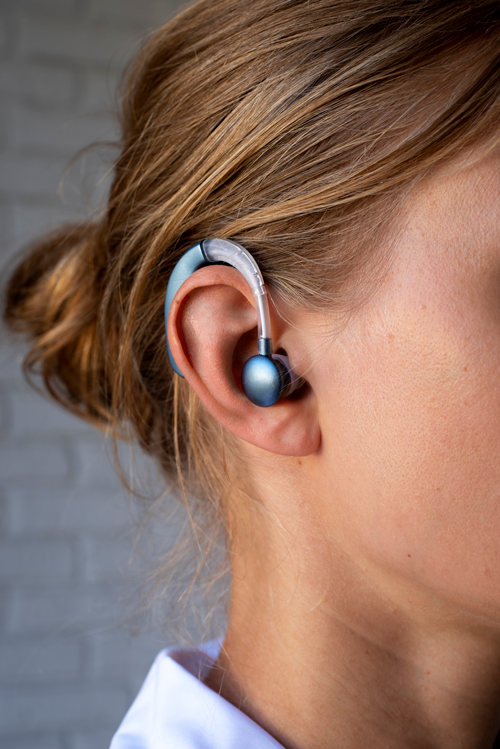 woman wearing hearing aids